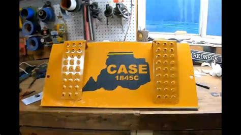 where is the battery on a case skid steer|youtube 1845c case battery.